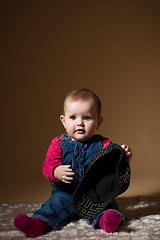 Image showing infant baby with black hat