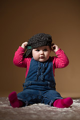 Image showing infant baby with black hat