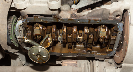 Image showing Car engine with the cover off the pallet. 