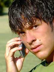 Image showing Young man with mobile