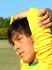 Image showing Young man in yellow