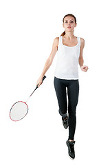 Image showing Beautiful girl with badminton racket in hands