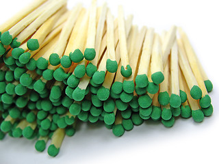 Image showing Green matches Isolated on white