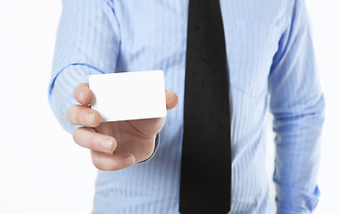 Image showing Businessman showing business card