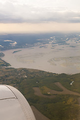 Image showing earth and plane wing view