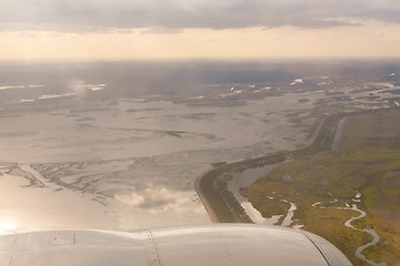 Image showing earth and plane wing view