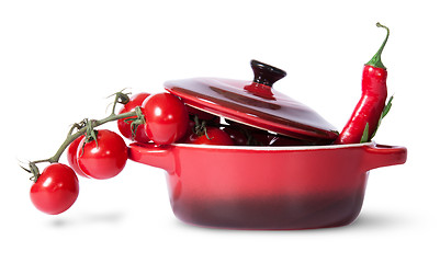 Image showing Cherry tomatoes with parsley and chili in saucepan