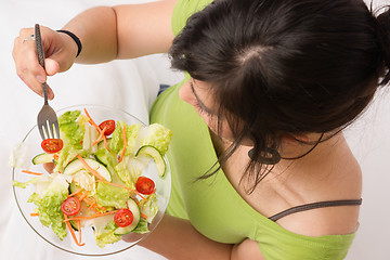 Image showing Healthy Eating Woman Enjoys Raw Food Fresh Green Salad