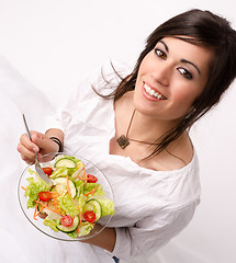 Image showing Healthy Eating Woman Enjoys Raw Food Fresh Green Salad