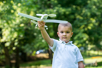 Image showing boy with airpane toy