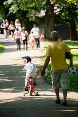 Image showing grandfather and child have fun  in park