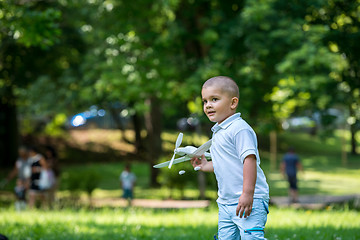 Image showing boy with airpane toy