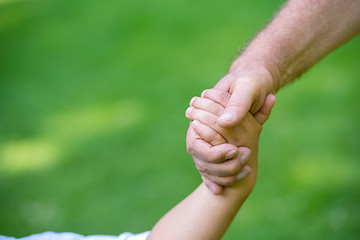 Image showing grandfather and child have fun  in park