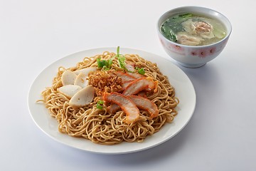 Image showing Fried noodle with roast pork sliced fish cake and dumpling soup