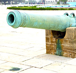 Image showing bronze cannon in africa morocco  green  and the old pavement