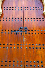 Image showing grey metal rusty      morocco in   facade home and safe padlock 