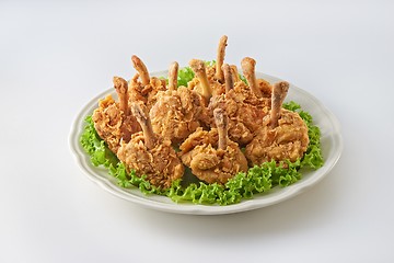 Image showing Fried chicken drum stick in plate