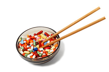 Image showing Bowl with drugs and chopsticks