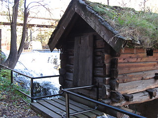 Image showing Small house by the water