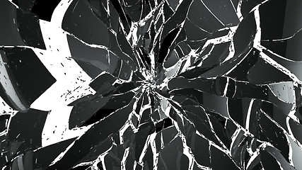Image showing Pieces of splitted or cracked glass on white background