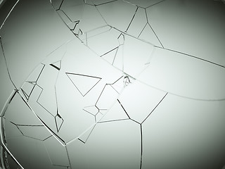 Image showing Splitted or cracked glass on grey 