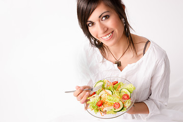 Image showing Healthy Eating Woman Enjoys Raw Food Fresh Green Salad