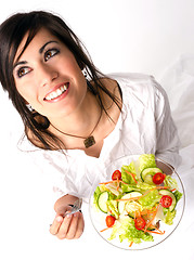 Image showing Healthy Eating Woman Enjoys Raw Food Fresh Green Salad