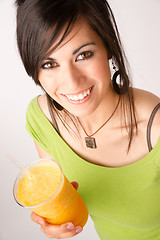 Image showing Attractive Woman Intimate Portrait Drinking Orange Fruit Smoothi