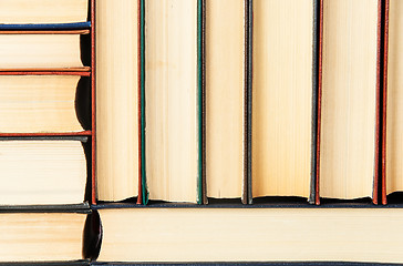 Image showing Abstract background of stacked on each other old books