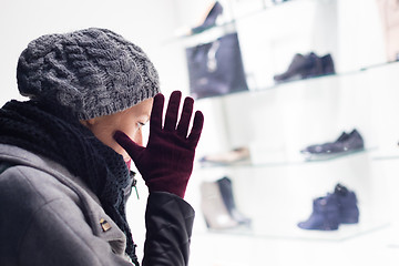 Image showing Woman window shopping.