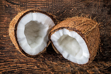 Image showing coconut on old wooden table