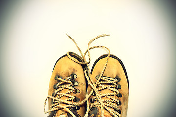 Image showing White background with yellow shoes