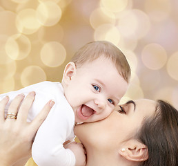 Image showing laughing baby playing with mother