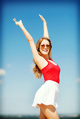 Image showing girl standing on the beach