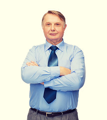 Image showing smiling businessman or teacher