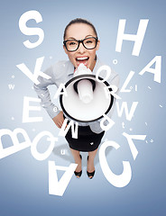 Image showing screaming businesswoman with megaphone