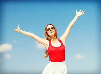 Image showing girl standing on the beach