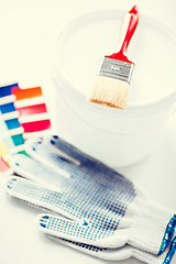 Image showing paintbrush, paint pot, gloves and pantone samples