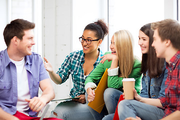 Image showing students communicating and laughing at school