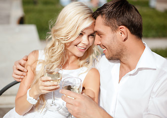 Image showing couple drinking wine in cafe