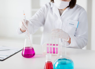 Image showing close up of scientist making test in lab