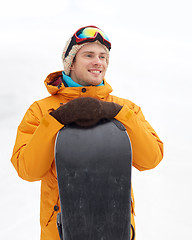 Image showing happy young man in ski goggles outdoors