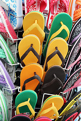 Image showing Bright flip flops for summer.