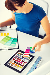 Image showing woman working with color samples for selection