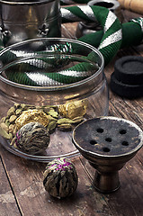 Image showing hookah and dry elite tea leaves