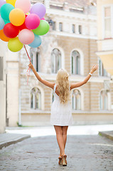 Image showing woman with colorful balloons