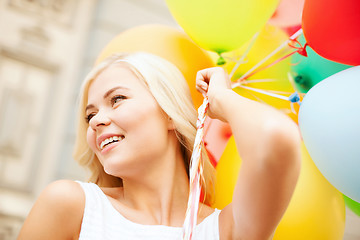 Image showing woman with colorful balloons