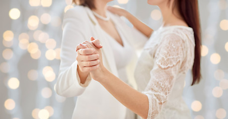 Image showing close up of happy married lesbian couple dancing