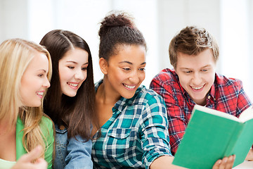 Image showing students reading book at school