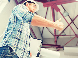 Image showing man with blueprint